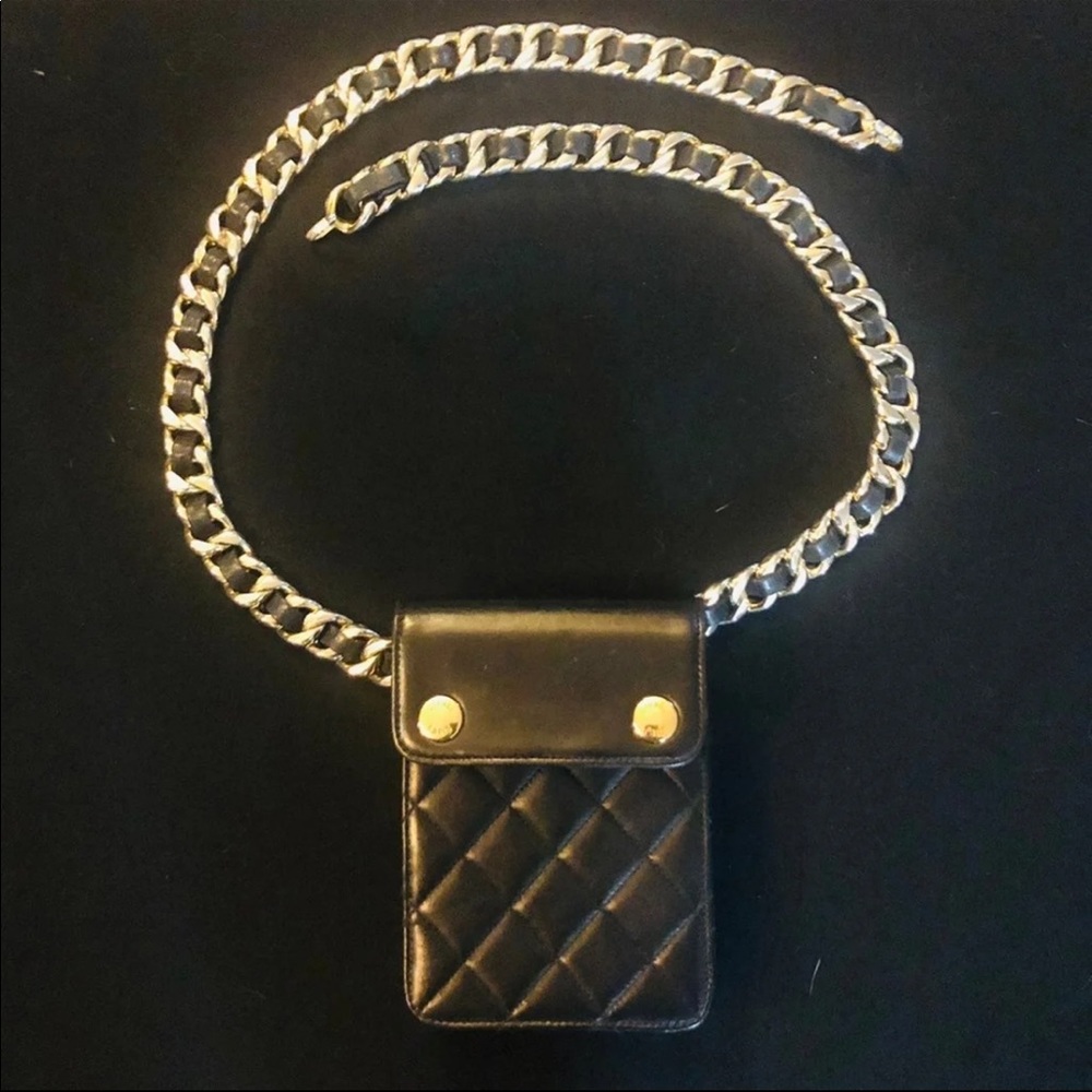 CHANEL waist bag with gold chain belt.
